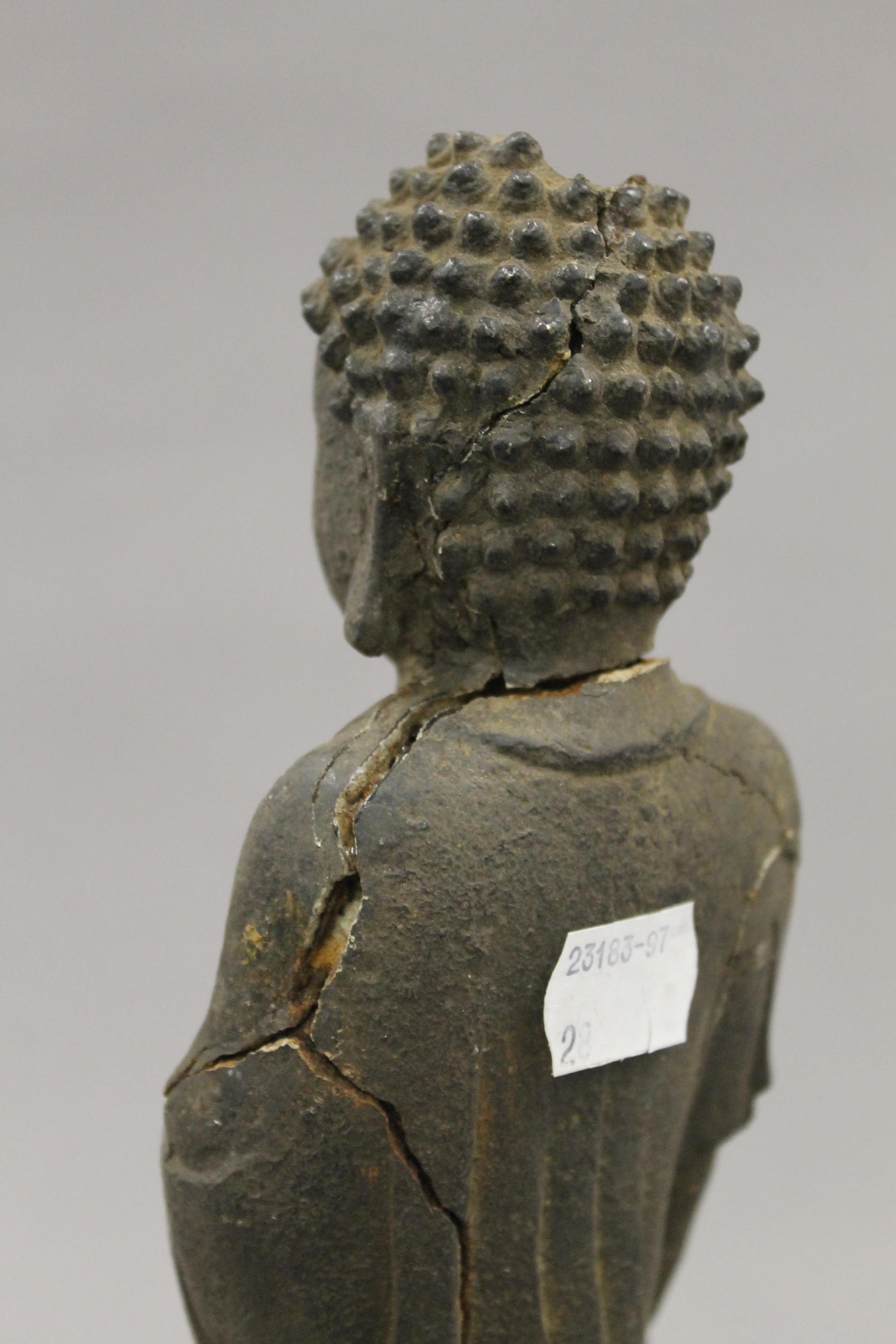 An antique Chinese iron model of buddha. 27 cm high. - Image 7 of 7