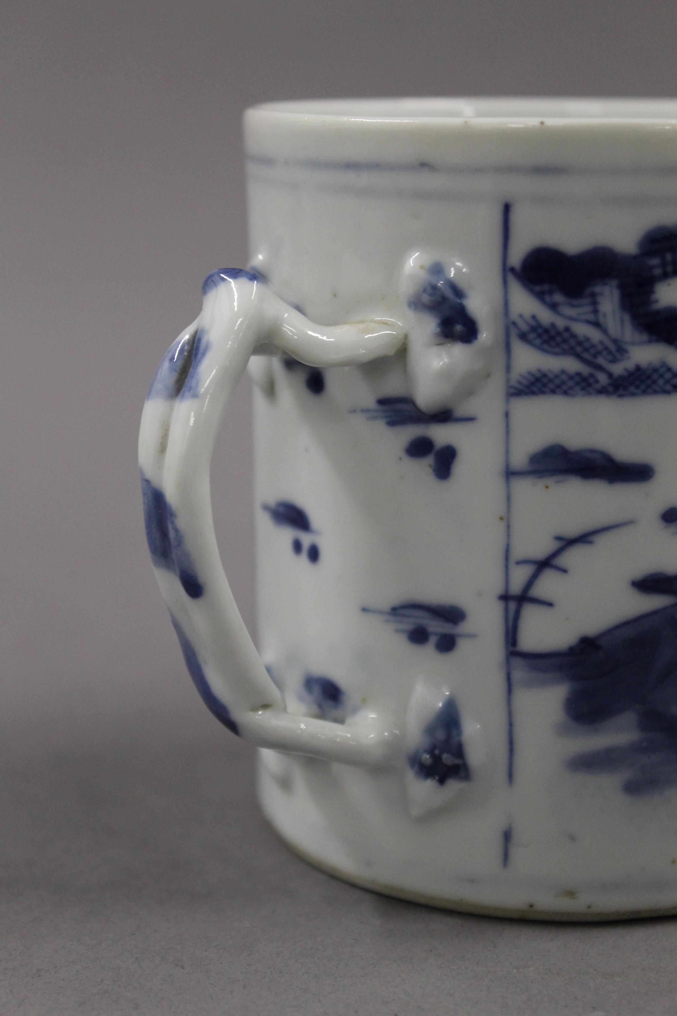 An 18th/19th century Chinese blue and white porcelain mug. 9.5 cm high. - Image 2 of 3