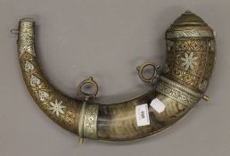 An Eastern metal mounted gunpowder horn. 34 cm long.
