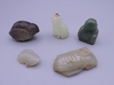 Five Chinese jade carvings. The largest 4.5 cm long.