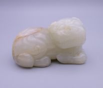 A Chinese carved jade dog-of-fo. 6 cm long. (purchased from Sotheby's 1994 for £588).