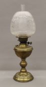 A Victorian brass oil lamp. 54 cm high overall.