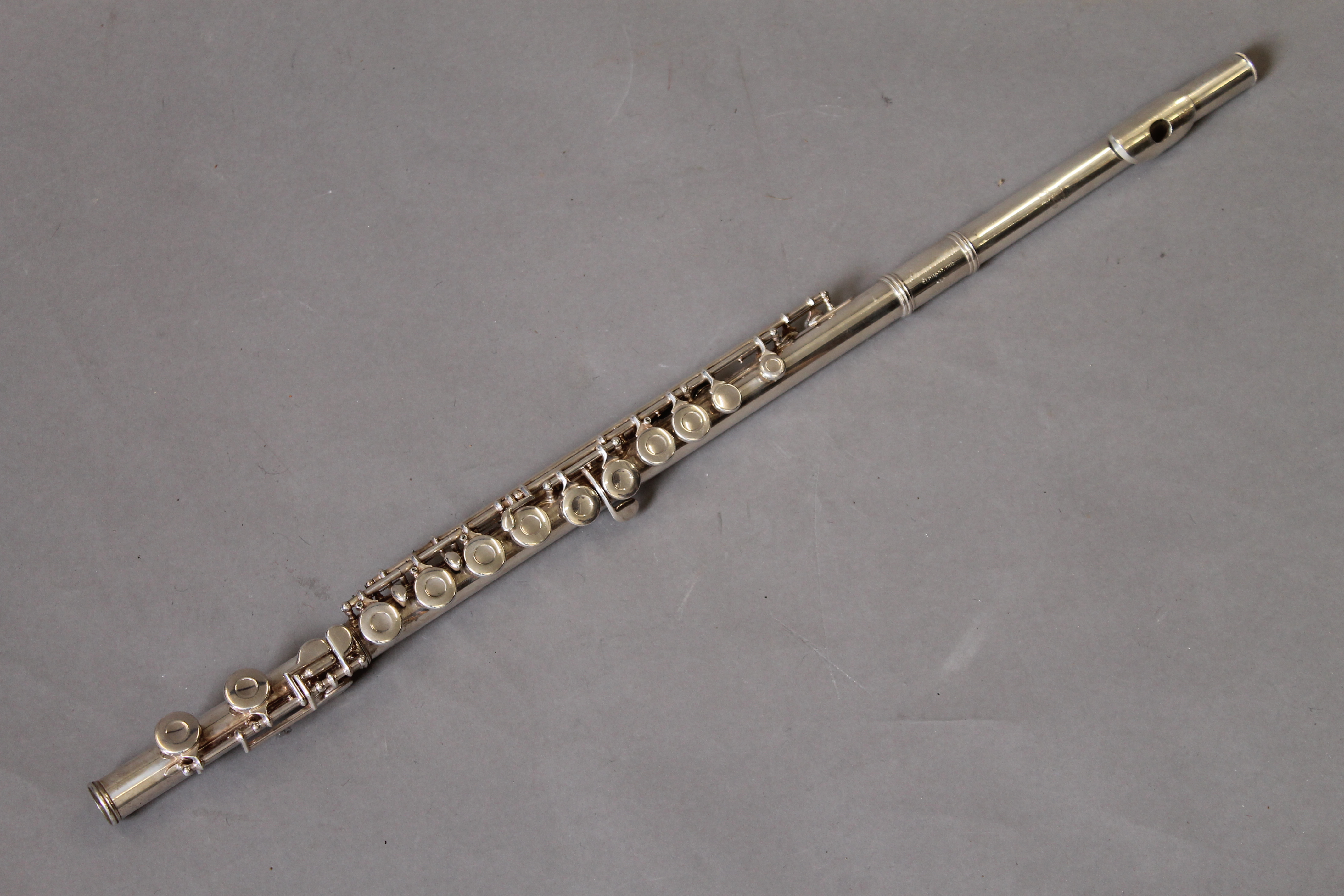 A Gemeinhadt USA silver plated flute, cased.