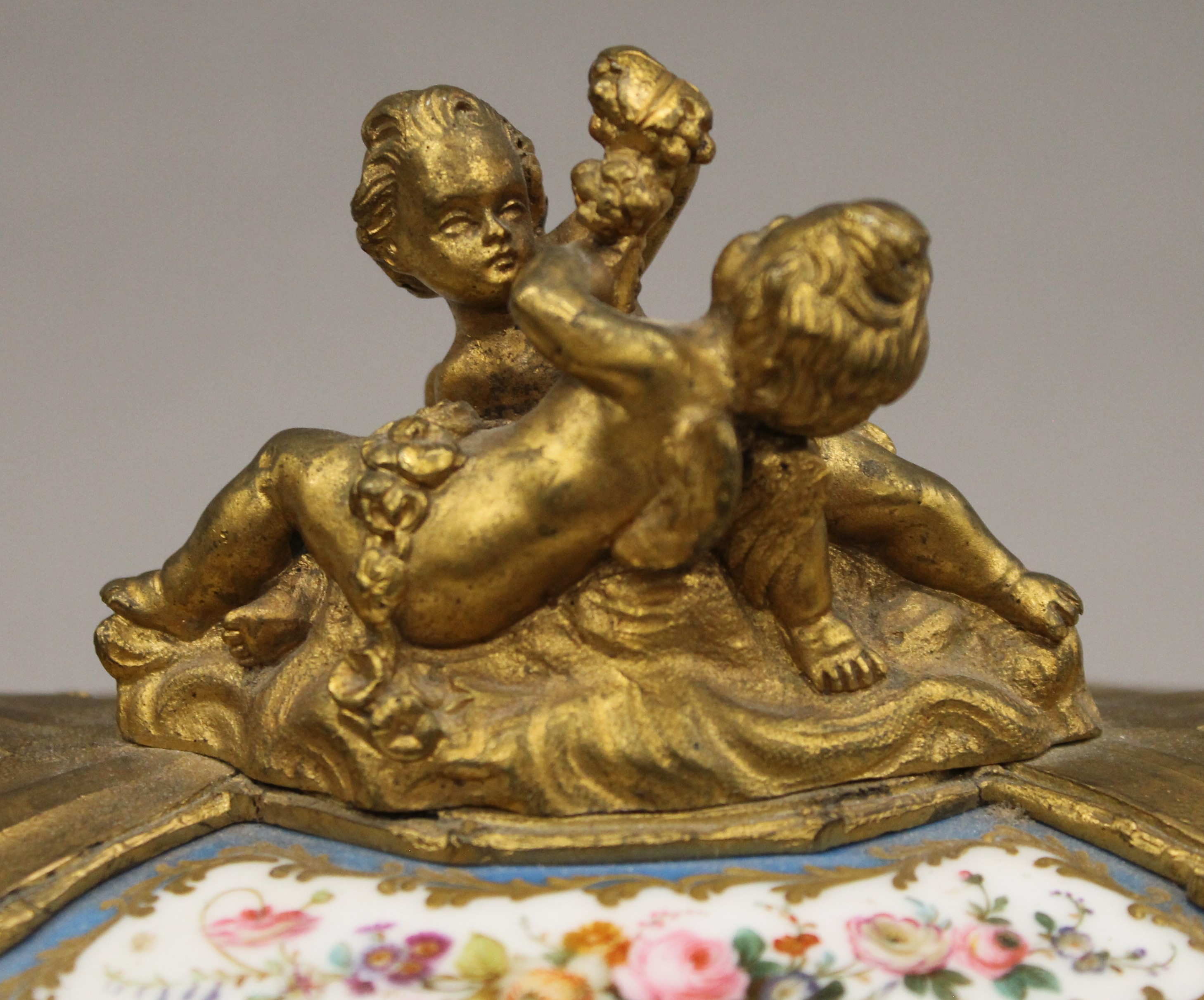 A 19th century Continental painted porcelain mounted ormolu casket. 25 cm wide. - Image 3 of 7