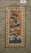 A Chinese embroidered sleeve panel, framed and glazed. 24.5 x 39 cm overall.