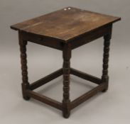 An 18th century oak side table. 70 cm wide.