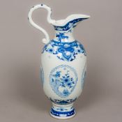 A Chinese blue and white porcelain ewer, with loop handle,