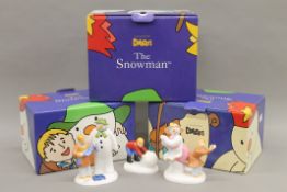 Three boxed Coalport Characters The Snowman figurines.