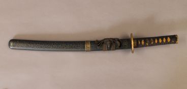 A Japanese sword. 66 cm long.