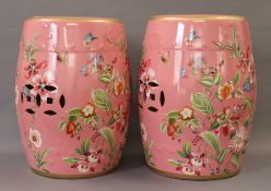 A pair of pink porcelain barrel seats. 43 cm high.