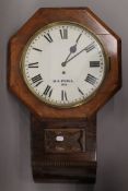 A walnut drop dial wall clock, inscribed 'W A Pyall 1924'. 42 cm wide.