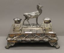 A silver plated desk stand. 26.5 cm wide.