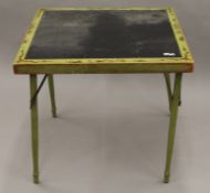 An early 20th century chinoiserie decorated folding card table. 76 cm square.