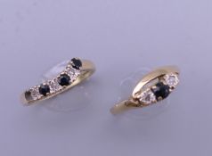 Two 9 ct gold diamond and sapphire rings. Each ring size J/K. 3.2 grammes total weight.