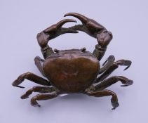 A bronze model of a crab. 10.5 cm wide.