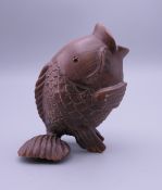 A Japanese carving of a fish. 7 cm high.