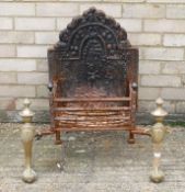 A brass and cast iron fire grate. 72 cm wide, 72 cm high, 43 cm deep.