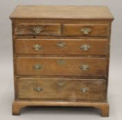 A 19th century oak chest of drawers. 91 cm wide.