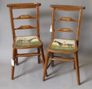 A pair of painted side chairs.