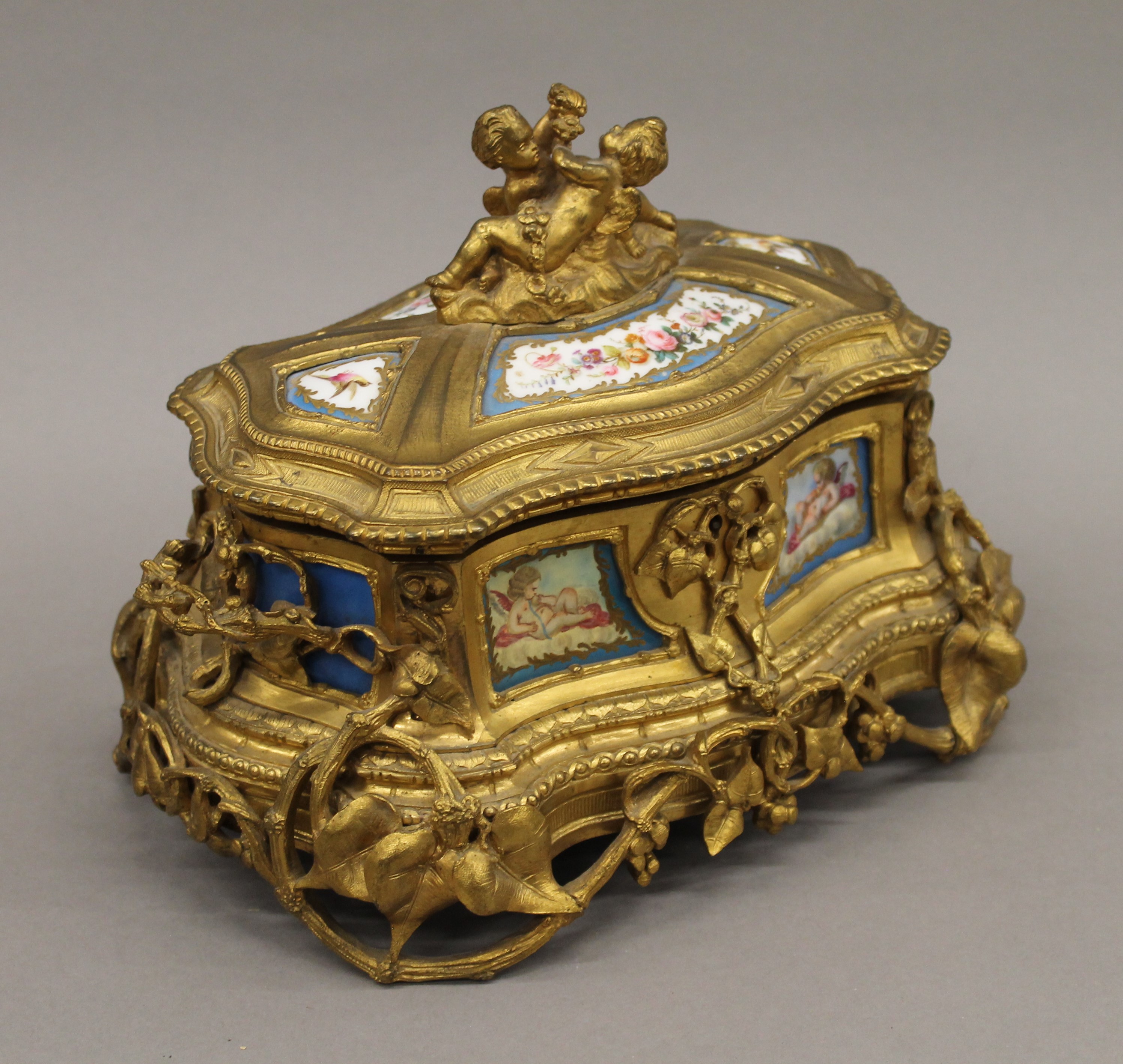 A 19th century Continental painted porcelain mounted ormolu casket. 25 cm wide. - Image 4 of 7