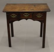 An 18th century oak lowboy. 78 cm wide.