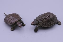 Two bronze models of tortoises. The largest 5.5 cm long.