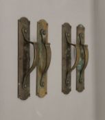 A set of Art Nouveau brass door handles. 33 cm high.