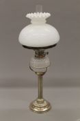 A Victorian silver plated oil lamp. 53 cm high overall.