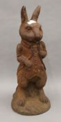 A cast iron model of Peter Rabbit. 49 cm high.