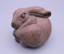 A Japanese carving of a rabbit. 6 cm high.