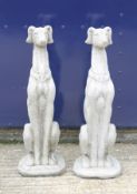 A pair of garden ornaments formed as greyhounds. 81 cm high.