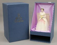 A boxed Royal Doulton figurine, Her Majesty Queen Elizabeth II.