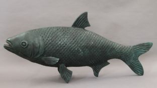 A large bronze model of a carp. 99 cm long.