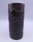 A late 19th/early 20th century Chinese carved bamboo brush pot. 15.25 cm high.