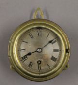 A small brass ships clock. 11.5 cm diameter.