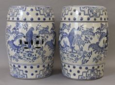 A pair of porcelain blue and white barrel seats. 43 cm high.