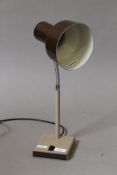 A brown angle poise lamp, model number 99.