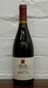 A single bottle of 2002 Domaine Laurent Gauthier Morgon Grand Cras Vieilles Vignes