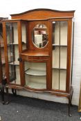 An Edwardian glazed inlaid mahogany display cabinet. 175 cm high, 121.5 cm wide, 37 cm deep.