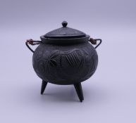 A small Irish bog oak cauldron. 5 cm high.