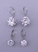 A pair of 925 sterling silver cubic zirconia lever back drop earrings and another smaller pair of