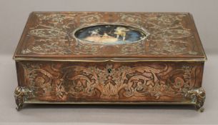 A 19th century French copper jewellery box, the lid set with a miniature. 24.5 cm wide.