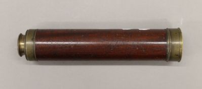 A Victorian three drawer telescope by G Wilson of London. 75.5 cm long extended.