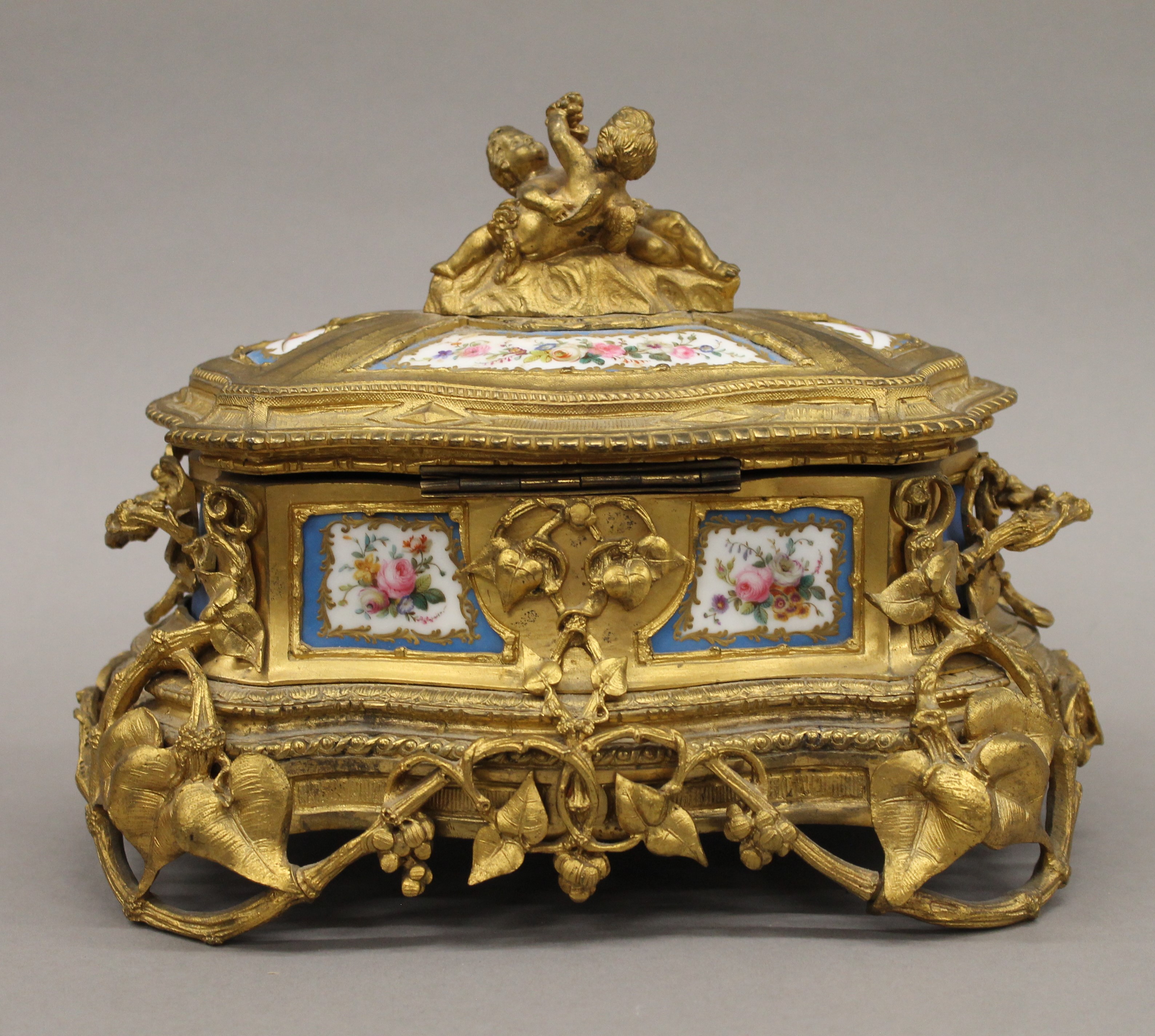 A 19th century Continental painted porcelain mounted ormolu casket. 25 cm wide. - Image 7 of 7