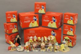 Ten boxed Royal Doulton Show Case Collections Snow White and The Seven Dwarfs figurines.