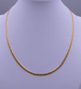 A 14 ct gold necklace. 40 cm long. 9 grammes.