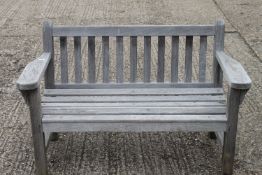 A garden bench. 133.5 cm wide, 85 cm high, 60 cm deep.