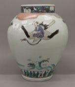 An Oriental porcelain vase of baluster form. 31 cm high.