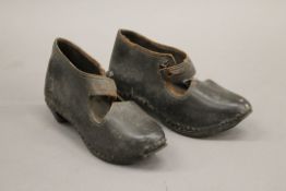 A pair of 19th century children's studded leather shoes.