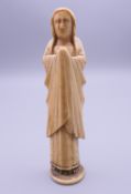 An 18th/19th century ivory model of The Virgin Mary. 9.5 cm high.